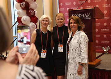 Three people posing for a photo. Links to Gifts of Cash, Checks, and Credit Cards